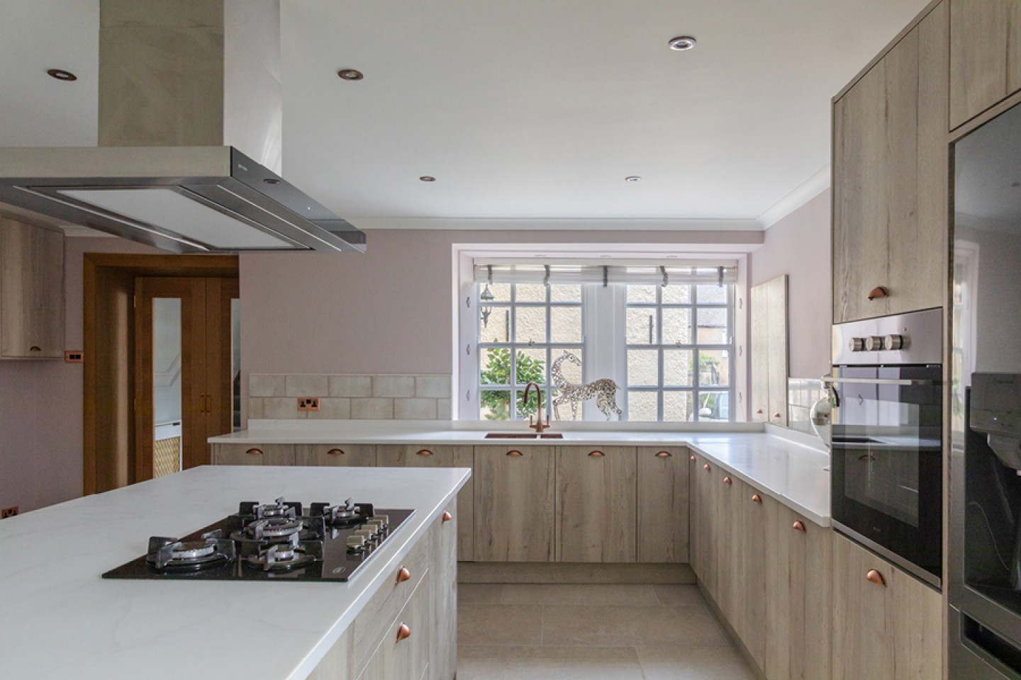 Modern, neutral coloured Kitchen with Island 